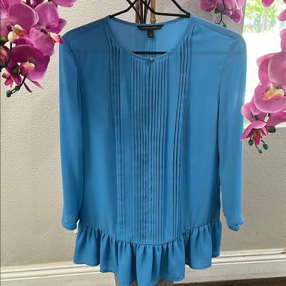 Blue Pleated Blouse with Ruffle Hem